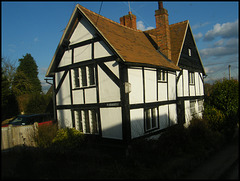 sunlight on a Tudor cottage