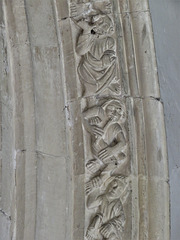 lawford church, essex , lively acrobats and musicians on window moulding around a c14 chancel window
