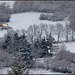 Paysage hivernal avec une pelleteuse jaune