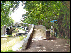 ugly signpost at historic bridge