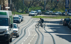 Tram pilots view - risky biker