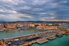 Civitavecchia ~ Italy ~ with his colorful houses and activity in the harbor
