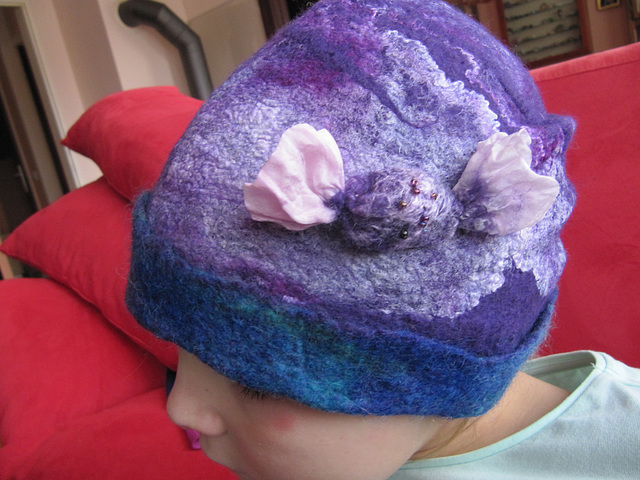 felted cap with a candy