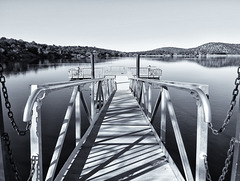 Fishing On The Dock Of The Lake