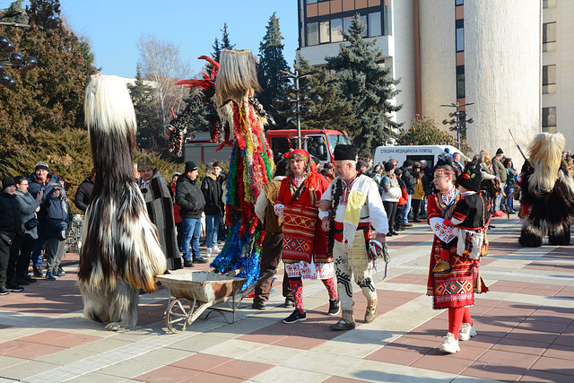 Bulgaria, Blagoevgrad, The Whole Family at the Carnival "Procession of the Kukers" Bulgaria, Blagoevgrad, The Whole Family at the Carnival "Procession of the Kukers"