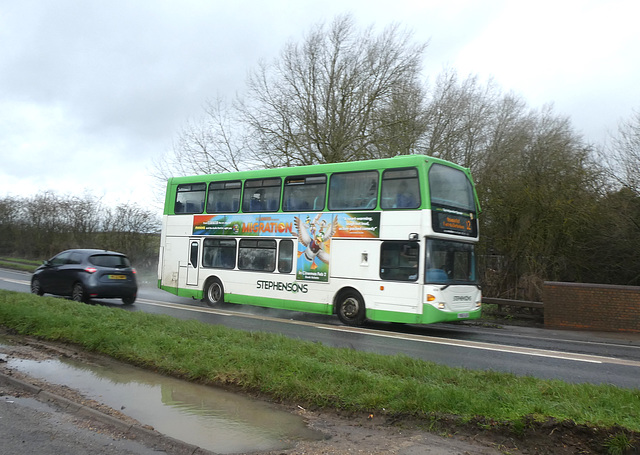 Stephensons of Essex 639 (YN55 NJK) splashing along the A1303 - 9 Feb 2024 (P1170290)