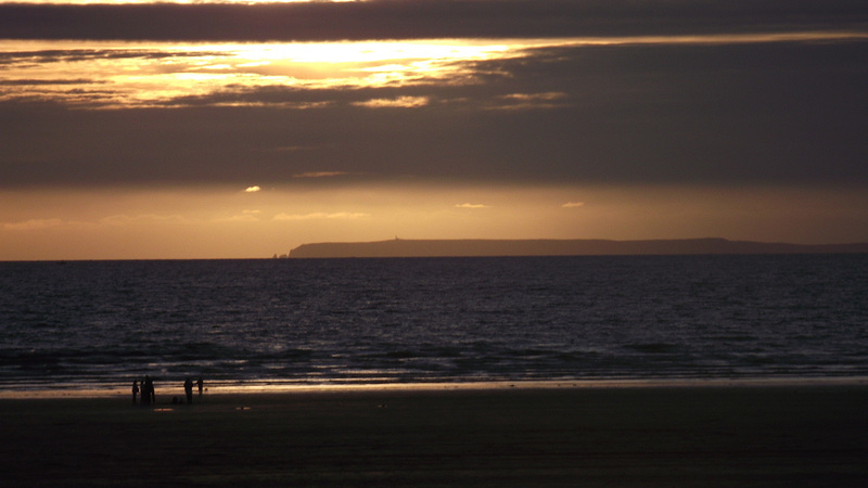 The sun looks as if it'll set behind the island