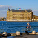 Gentleman sitting on bench and Haydarpasa Train Station