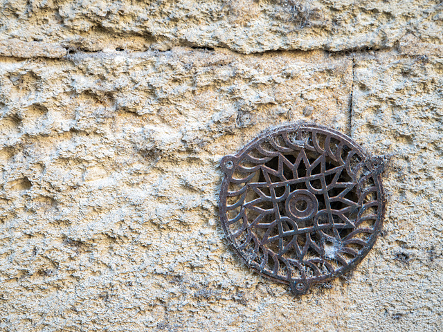 Drain in a wall