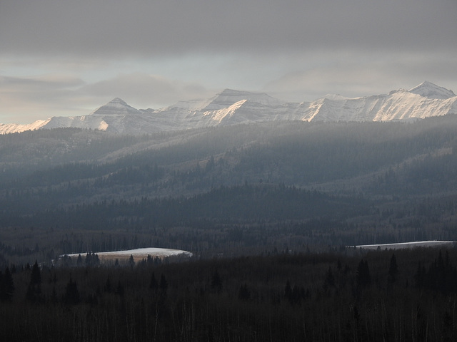 A touch of sun on the distant peaks