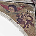 barking church, essex, painting on spandrel over chancel arch. restored c17 cherub, but what to make of figures below? perhaps a dishonest alewife and devil with falling soul below