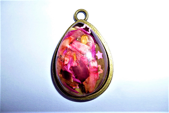 A delicate pink coloured pendant