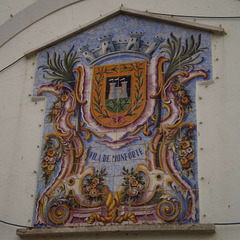 Tiles panel with coat of arms.