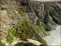 Blue rope. Path to the beach at high tide. Porthtowan, Cornwall