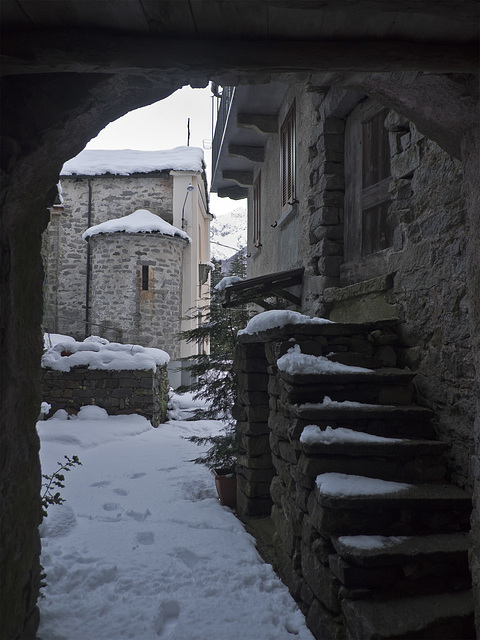 Arches and stone steps in the old village