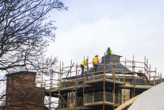 Workers on a Roof