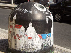 Depicting Lisbon on glass container.