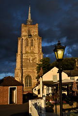 Bushel and Strike pub, with St Mary's church Ashwell