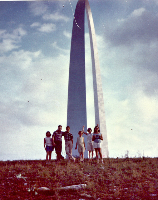 A collection of my wife's siblings and cousins, gathered some distance from the newly opened Gateway Arch in St. Louis, Missouri, 1966.