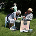 Two visitors with a vintage poster