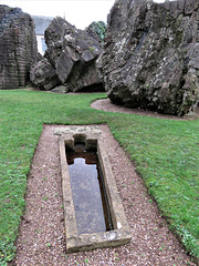 torre abbey, devon , coffin in chancel looking west to the ruined crossing