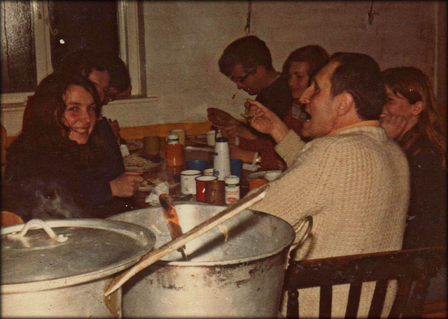 Enjoying supper! (But then, I was the chef!). From a scanned print. Climbing hut.