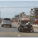 Transporting a motorcycle on a tuk-tuk