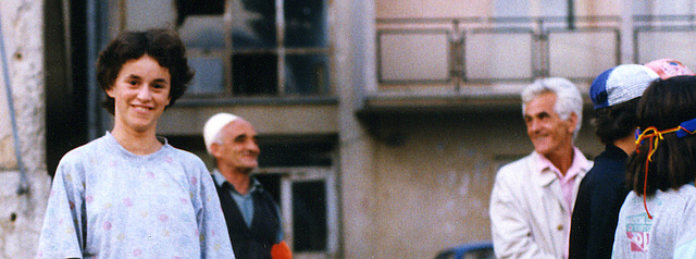 girl and old men in novo brdo