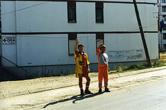 two kids wave