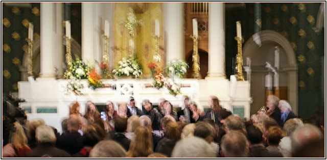 Singing and dancing at the funeral