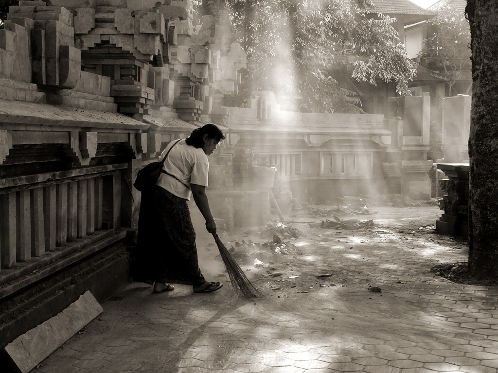 Lady with broom.