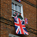 flags out for the Queen