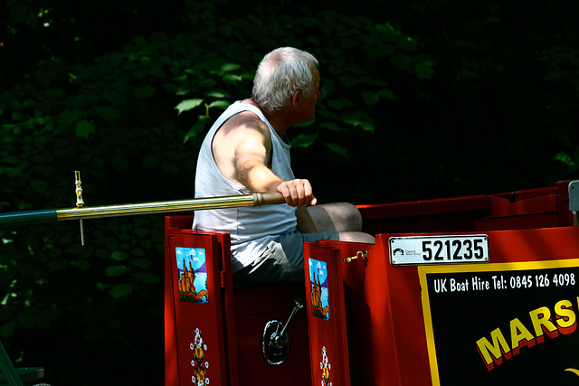 Man in a Vest on a Boat