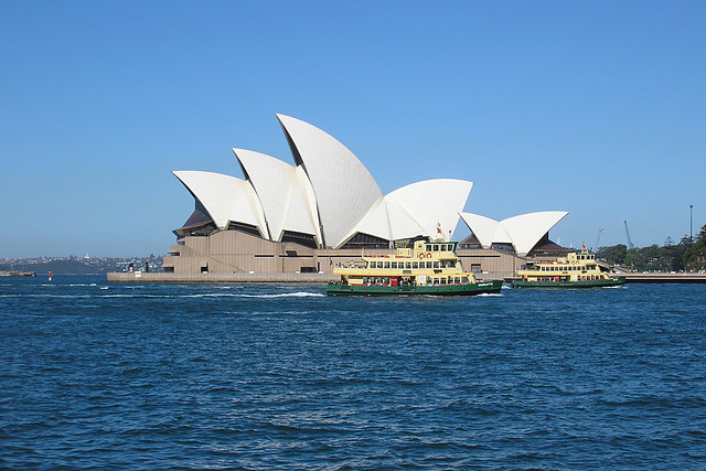 Ferries In Front Of The Opera House