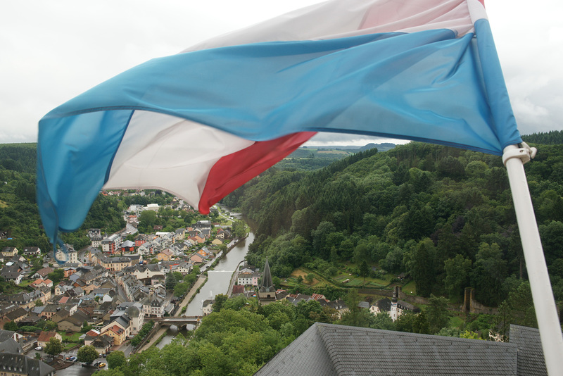 Luxembourg Flag Flying Over Vianden Castle