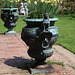 Bronze urns with narcissi
