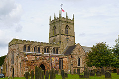 Flying the Red Ensign for Merchant Navy Day over St Lawrence's, Gnosall