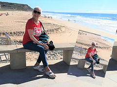 The girl in a red T-shirt at Areia Branca Beach