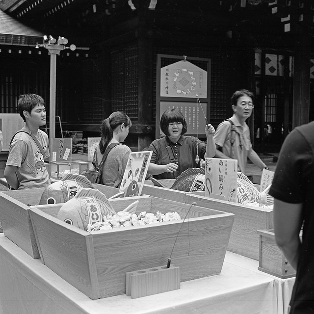 Fishing the good fortune at a shrine