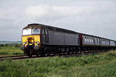 WCRC class 57 57316 with 1Z12 17.12 Scarborough - Dumfries at Willerby Carr crossing 30th May 2019
