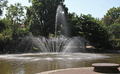 banc de pierre et bassin jardin Lecoq