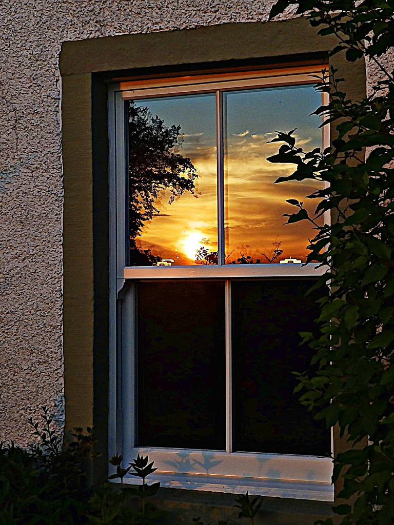 Sunset on a window
