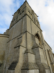 maxey church, hunts (1) early c12 tower with c14 buttresses