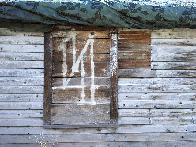 Shed with symbol
