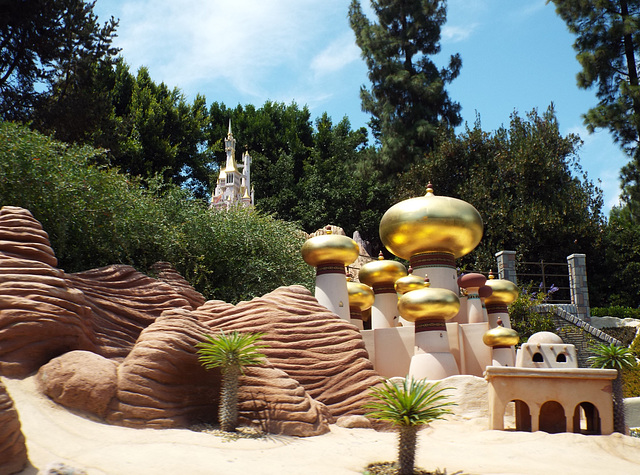 Cinderella's Castle and Aladdin's Palace in the Storybookland Canal Boats in Disneyland, June 2016