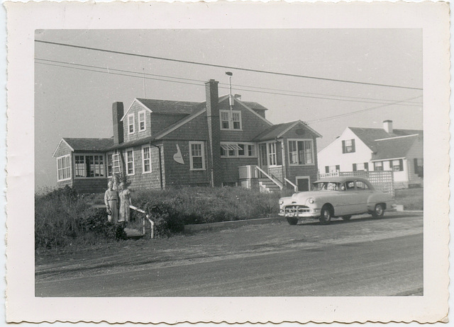 Proud of Their Shingled House