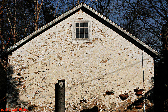 Gable End with a Devil Post