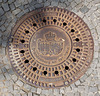 Kanaldeckel mit Stadtwappen