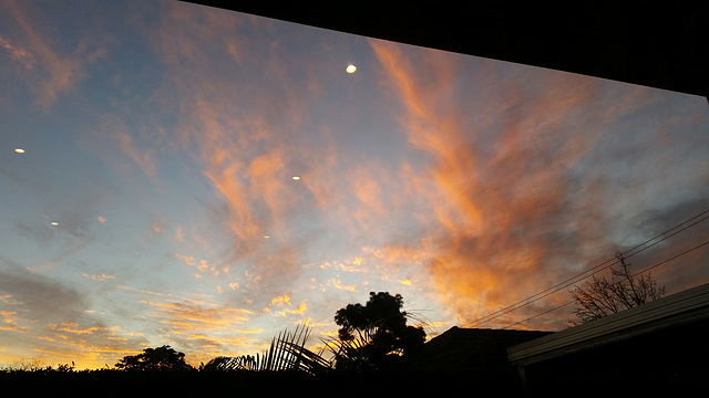 Sunset with kitchen lights