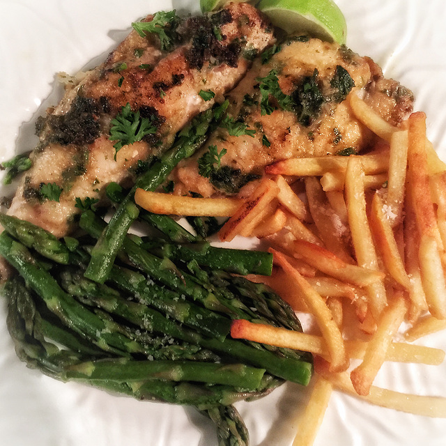 gurnard cooked in lime & garlic with asparagus & chips